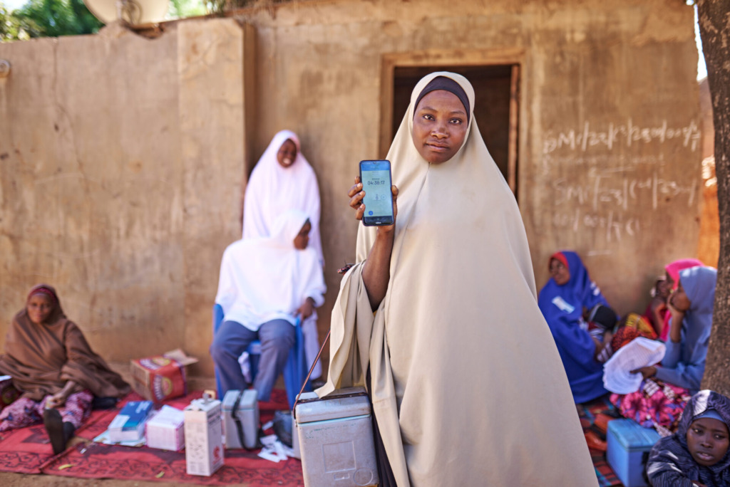 Saadatu Atiku, 30 a house to house mobilizer  shows off the GIS tracking app on her phone which she uses to track the areas she has covered in  Yabo LGA, Sokoto state
December 10, 2023
